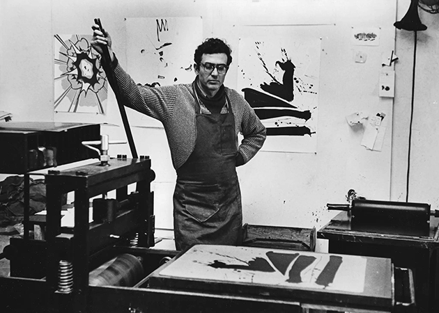 Irwin Hollander in 1966 working on Robert Motherwell’s lithograph “Automatism B.” He persuaded many Abstract Expressionist painters to try lithography. Credit...Dedalus Foundation/VAGA at ARS, NY